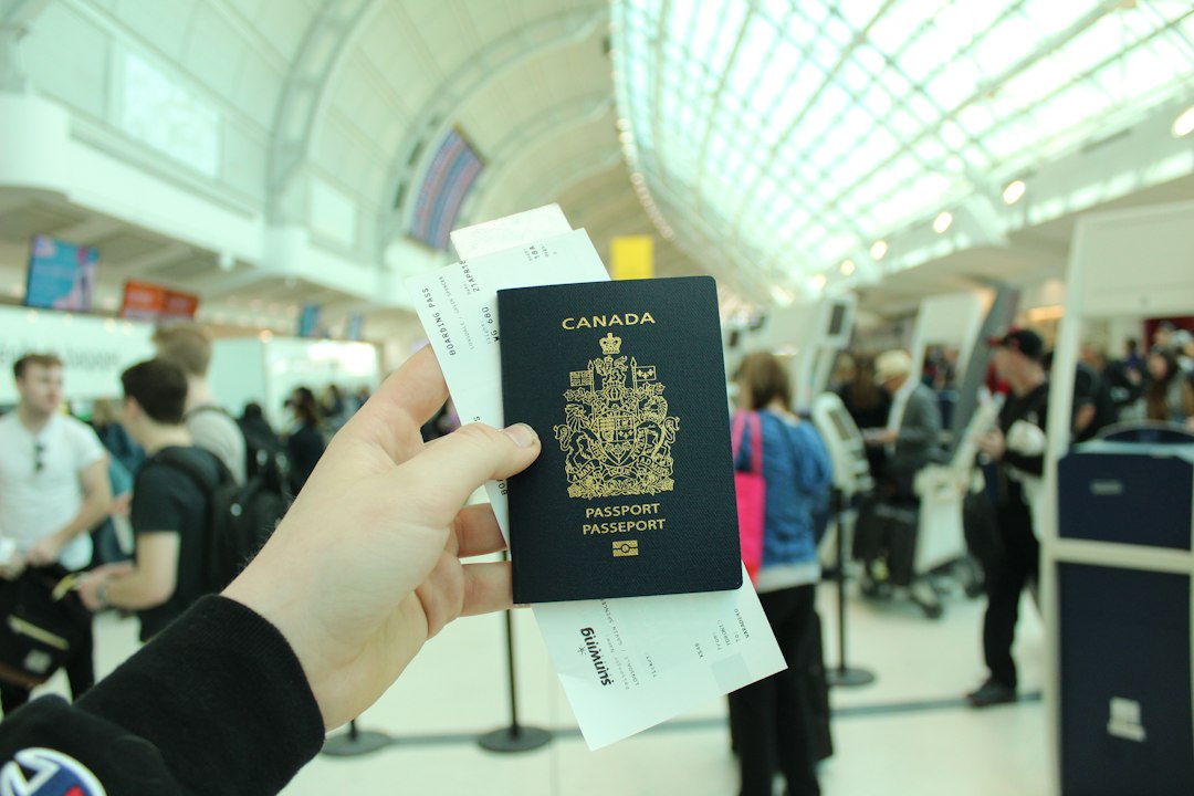 Canadian passport illustrating Express Entry permanent residence invitations